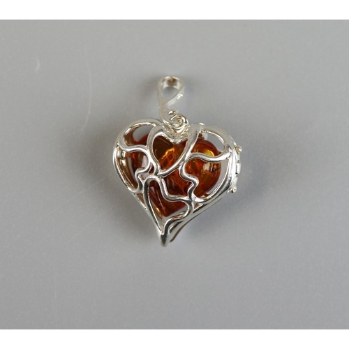 38 - Silver & amber heart pendant