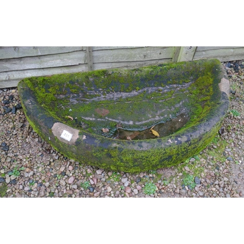 451 - Large well-weathered stone demi-lune trough