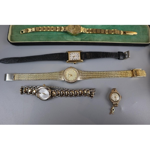 65 - Collection of watches to include gold watch