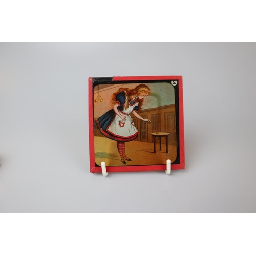 83 - Set of coloured magic lantern slides to include Alice in Wonderland