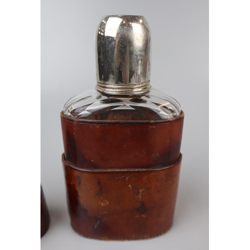 84 - Antique cut glass flask in leather case