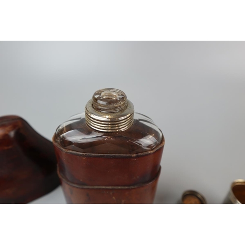 84 - Antique cut glass flask in leather case