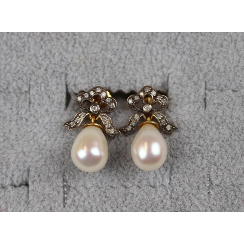 11 - Pair of pearl & diamond bow earrings