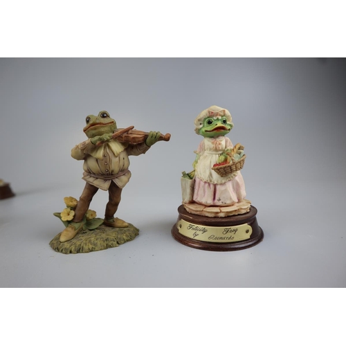 129 - Collection of elephant and frog figures