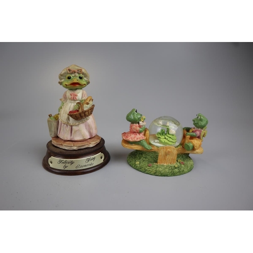 129 - Collection of elephant and frog figures