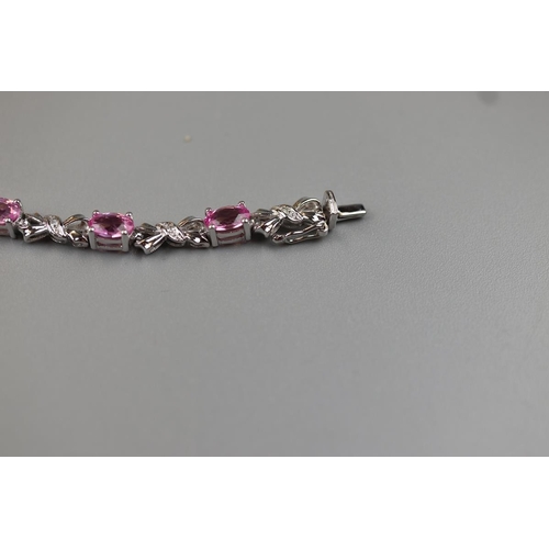 24 - Fine white gold, diamond & pink tourmaline bracelet