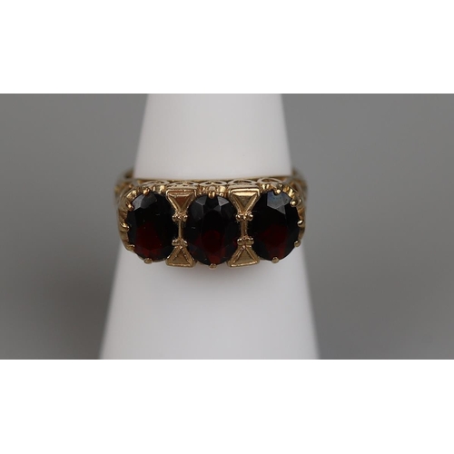 31 - Gold 3 stone garnet ring - Size N