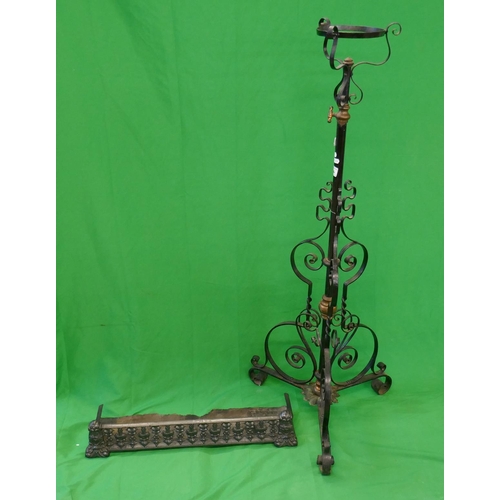 506 - Small black fender and oil lamp stand