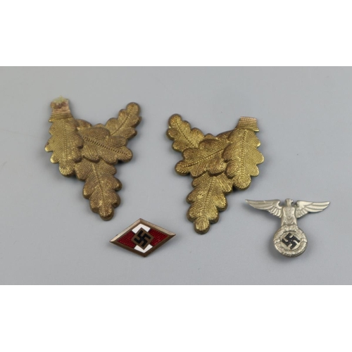 67 - 2 German badges and a pair of insignia