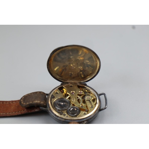 68 - Collection of military items to include silks, badges and carved pocket watch stand