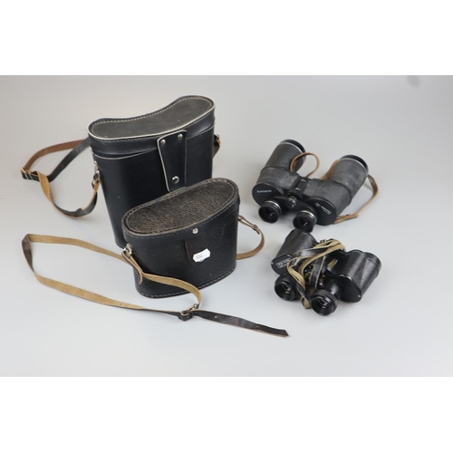 86 - Two sets of binoculars