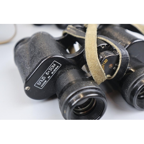 86 - Two sets of binoculars