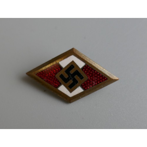 67 - 2 German badges and a pair of insignia