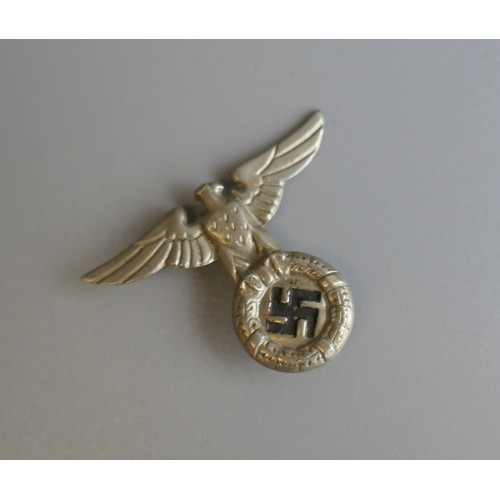 67 - 2 German badges and a pair of insignia