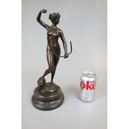 102 - Bronze nude with bow on marble base - Approx. height 33cm