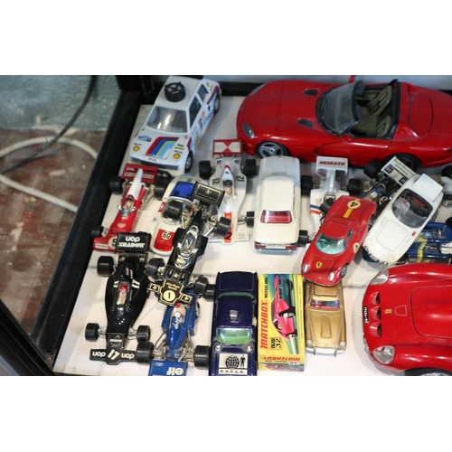 124 - Collection of diecast cars to include Corgi Dinky and boxed examples