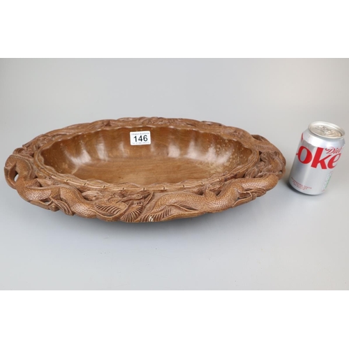 146 - Oriental carved oval wooden dragon bowl