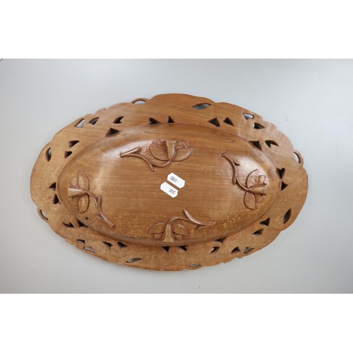 146 - Oriental carved oval wooden dragon bowl