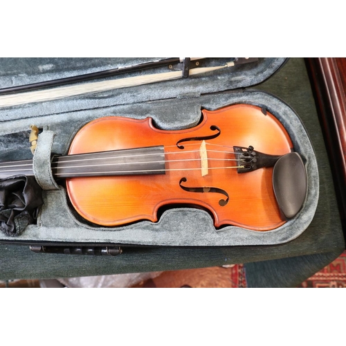 169 - 2 cased violins