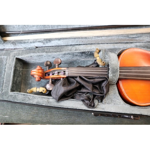169 - 2 cased violins