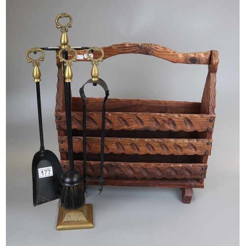 177 - Rustic carved magazine rack together with a metal and brass companion set