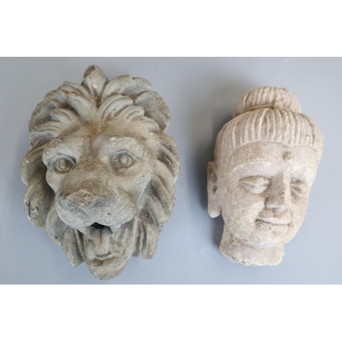 178 - 2 stone face masks lion and Buddha