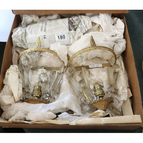 180 - Pair of gilt and crystal wall sconces