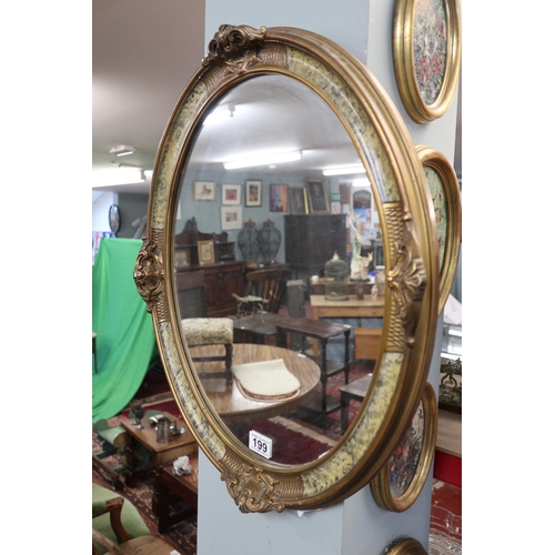 199 - Oval gilt framed mirror