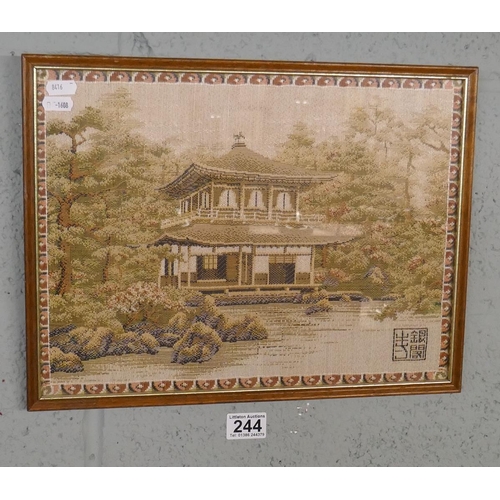 244 - Oriental framed tapestry of a pagoda - Approx. image size 38cm x 29cm