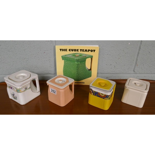 252 - 4 cube teapots together with collectors book