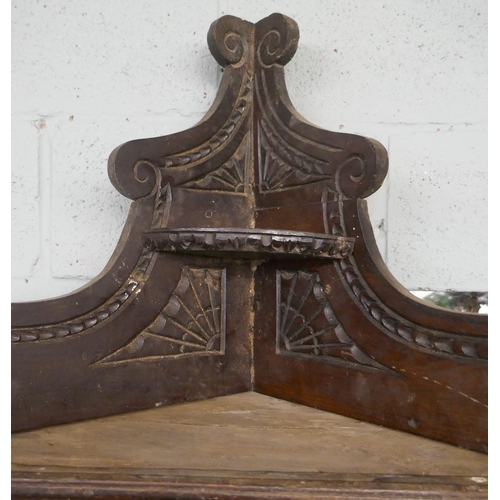 254 - Tall antique carved oak corner cupboard