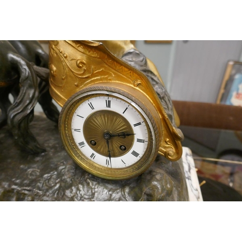 258 - 19thC metal and gilt centurion on horse drawn chariot clock and garnitures on marble base with ormol... 