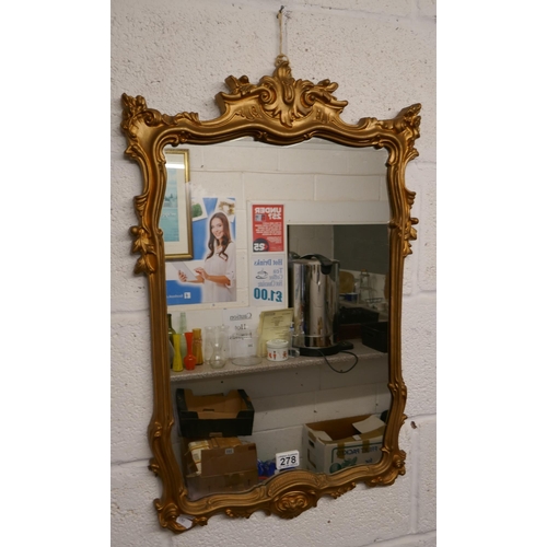 278 - Ornate mirror in gilt frame