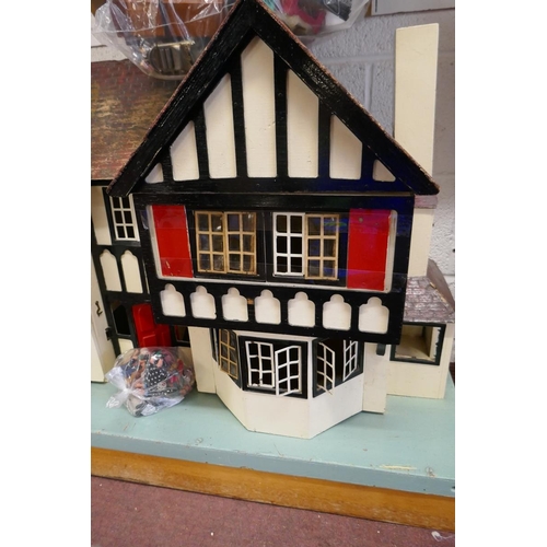 294 - Tri-ang stockbroker dolls house with furniture and dolls - Approx. size W:120cm D:46cm H:70cm