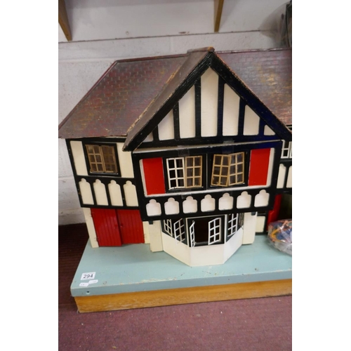 294 - Tri-ang stockbroker dolls house with furniture and dolls - Approx. size W:120cm D:46cm H:70cm