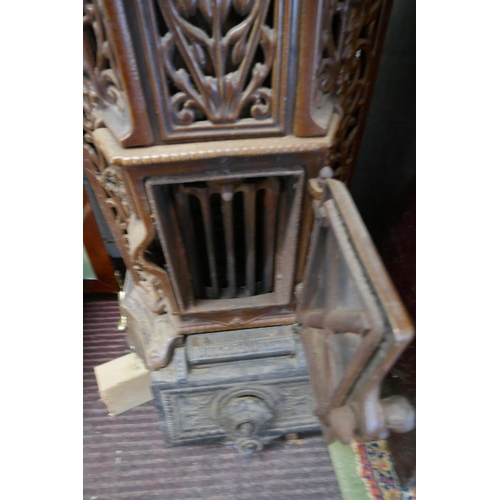 297 - Cast iron French glazed stove A/F - leg needs re-attaching