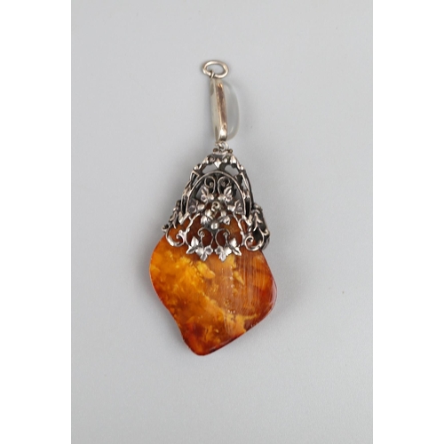 37 - Amber and moonstone pendant on silver mount