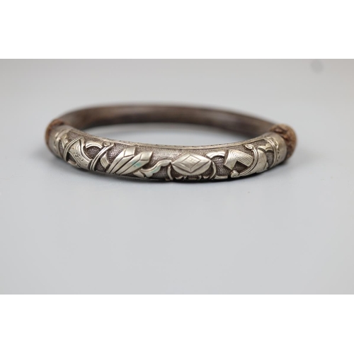 38 - Oriental bamboo and silver bangle