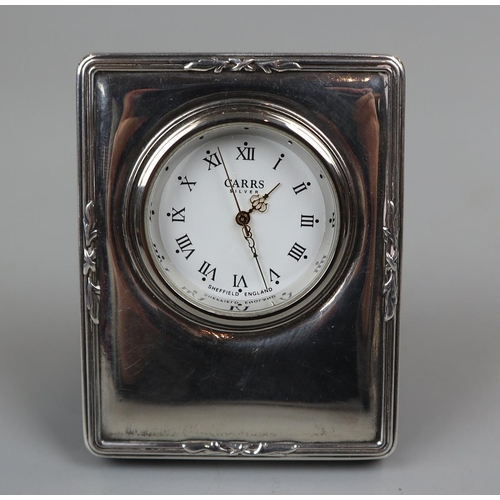 60 - A miniature hallmarked silver time piece by Robert Carr - Marked London 1993.