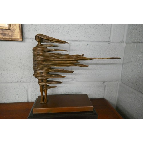 256 - Bronze wind blown figure on marble base - Approx. height 36cm