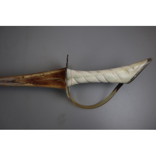 104 - Ivory tortoiseshell and fish bill ceremonial sword