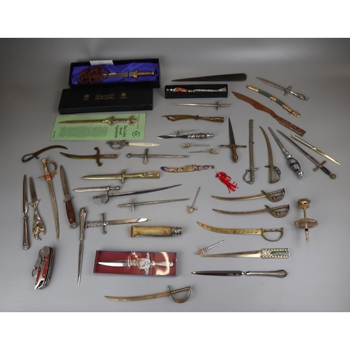 106 - Collection of knives and letter openers etc