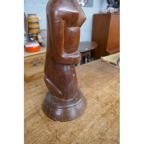 281 - Wooden carved African statue - Approx height 46cm