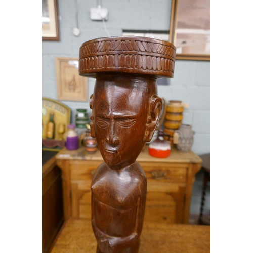 281 - Wooden carved African statue - Approx height 46cm