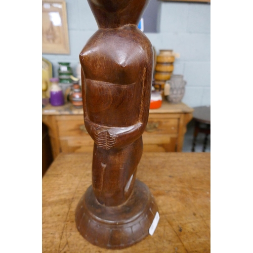 281 - Wooden carved African statue - Approx height 46cm