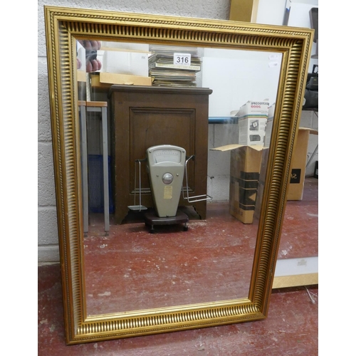 316 - Bevelled glass gilt framed mirror