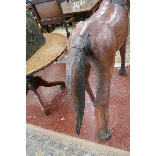 325 - Large Libertys of London style leather horse with some age - Approx L: 122cm H: 118cm