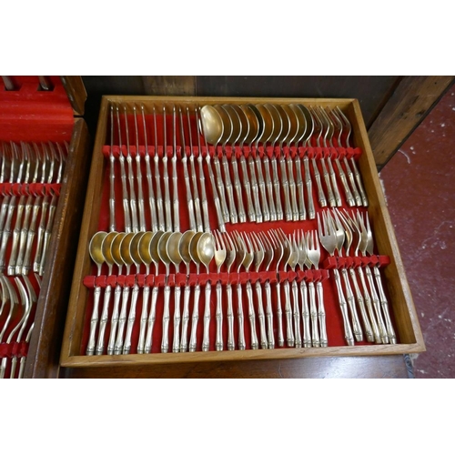 330 - Oak bow fronted cutlery chest to include cased canteen of gold tone cutlery by Royal Bamboo - Approx... 