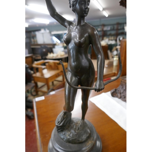 344 - Bronze nude with bow on marble base - Approx. height 33cm