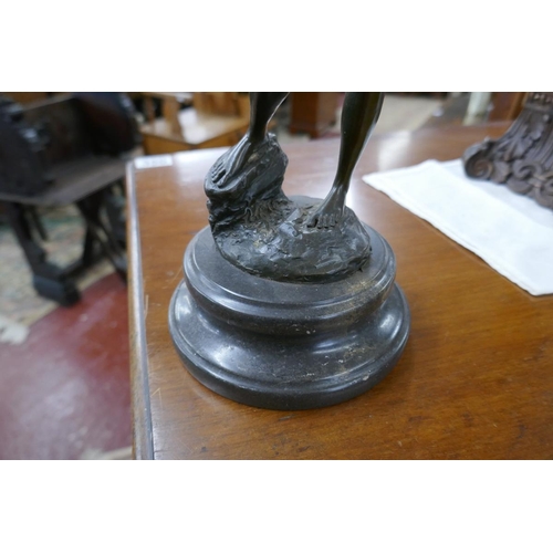 344 - Bronze nude with bow on marble base - Approx. height 33cm